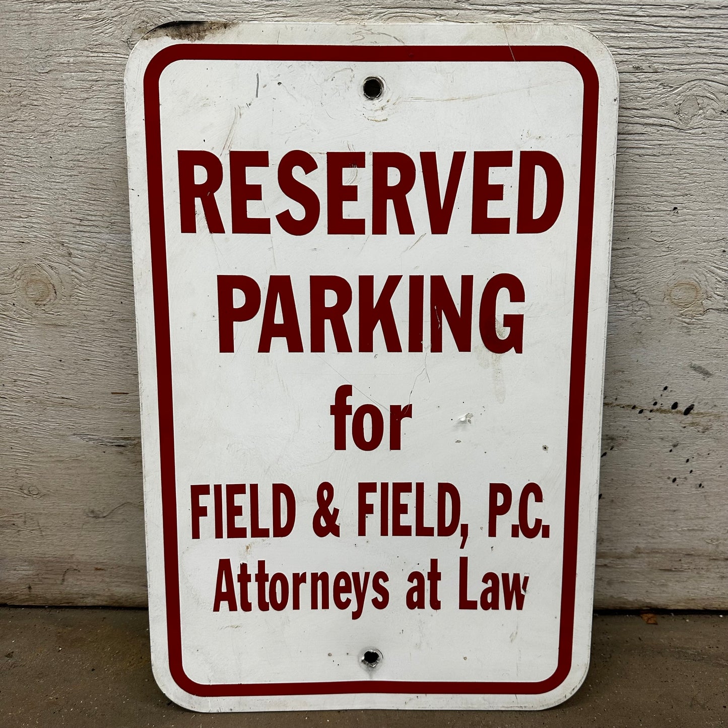 Two Reserved Parking Signs Field & Field