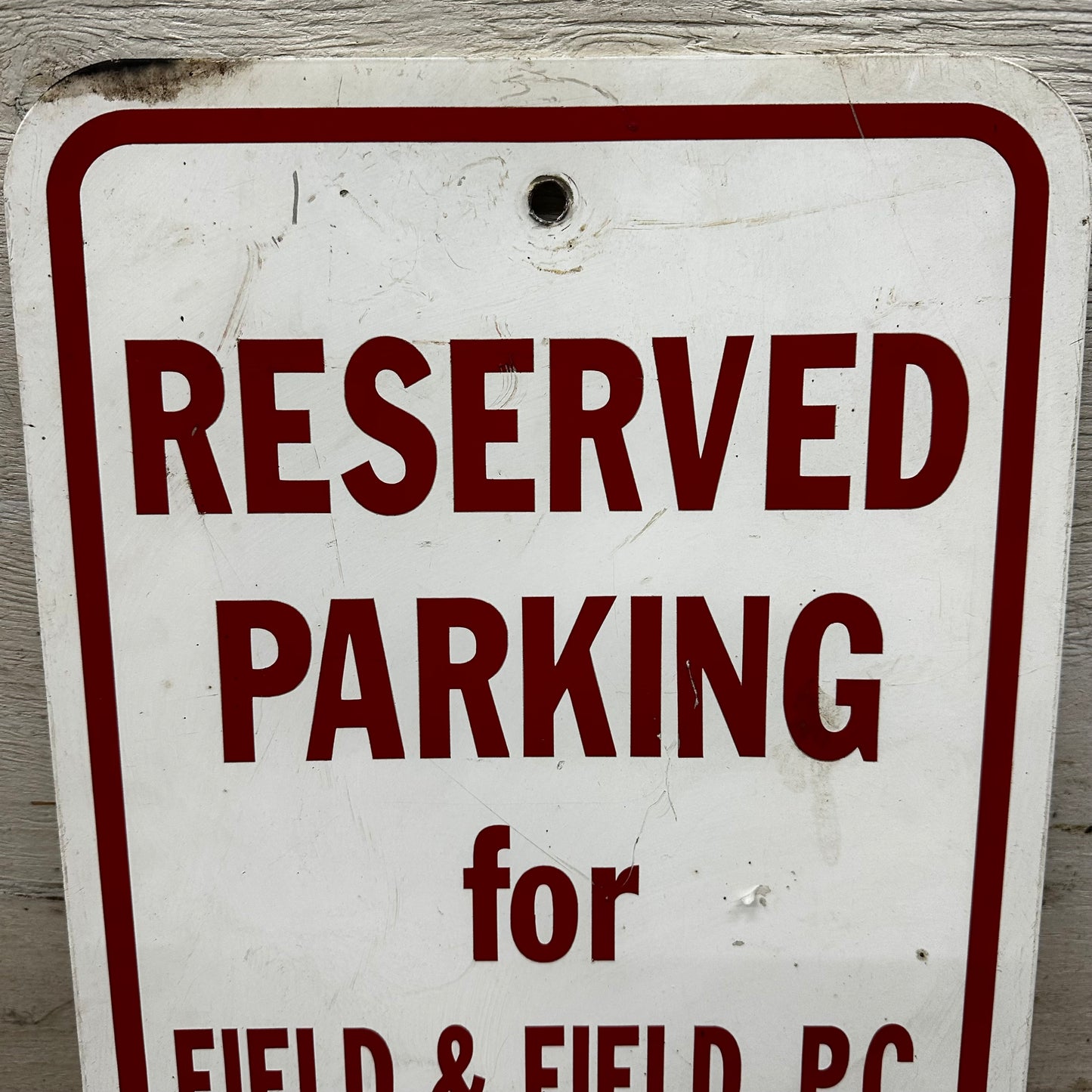Two Reserved Parking Signs Field & Field