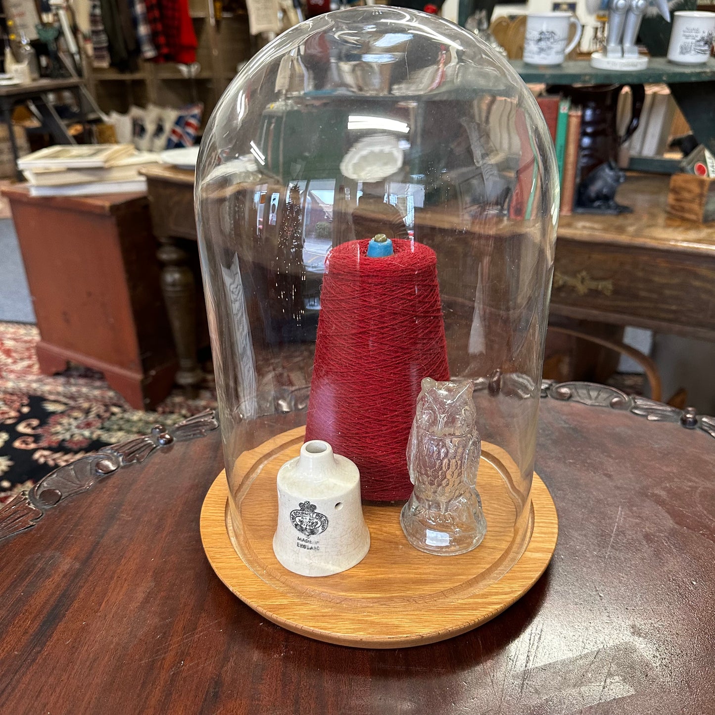 Glass cloche with wood base