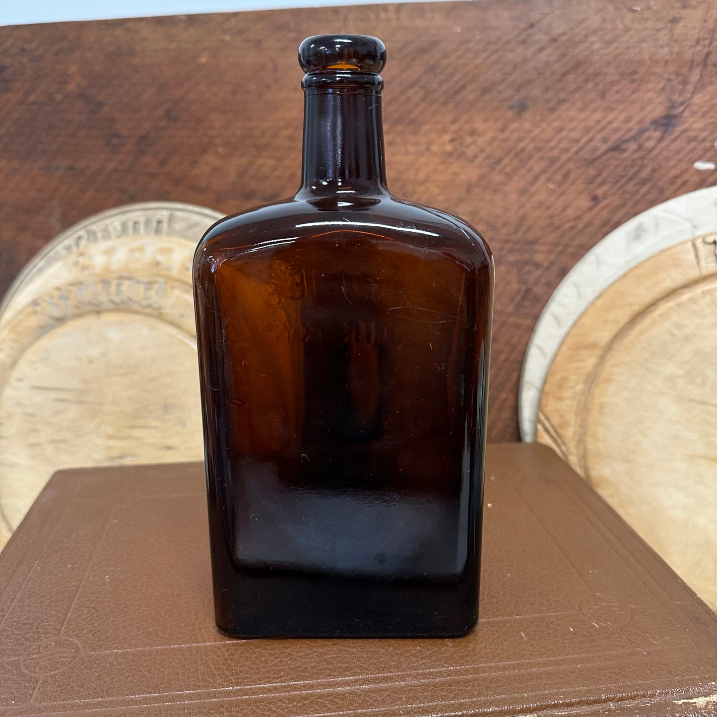 Ainslie’s Amber Whisky Bottle